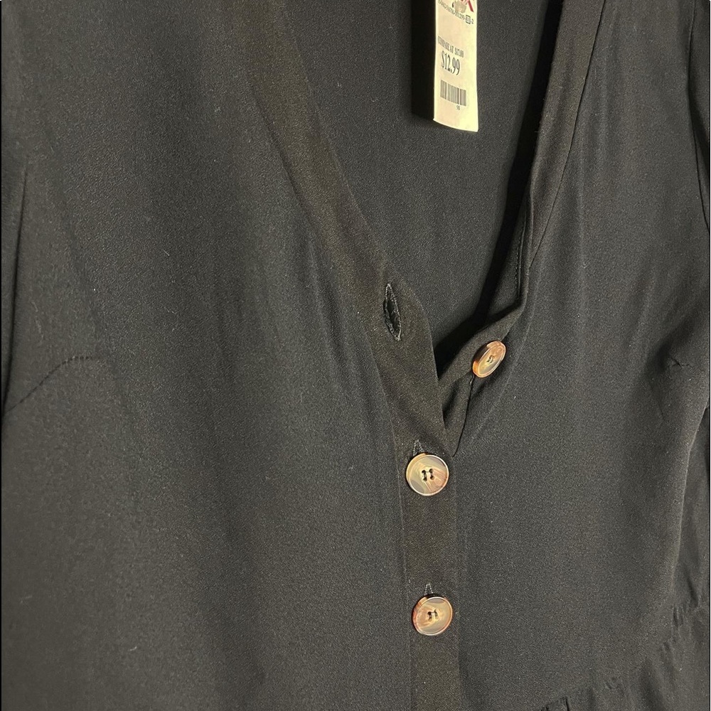Peplum Style Fitted Top with Button Detailing